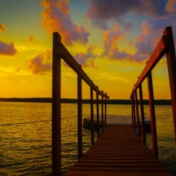 SUNSET BY THE WATER
